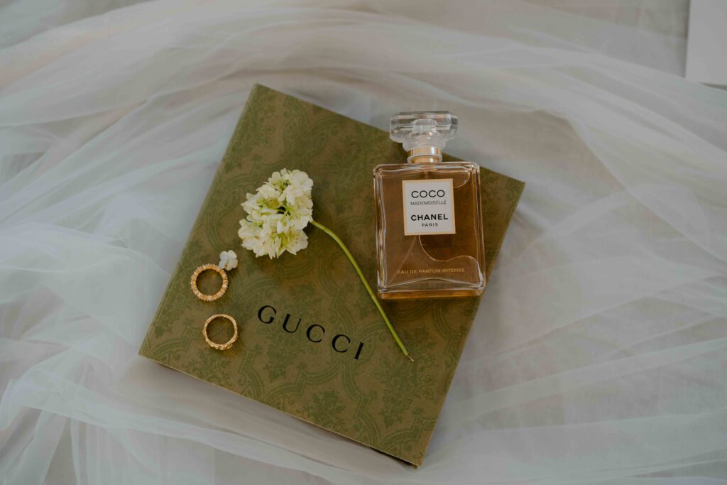 Wedding accessories arranged on a gucci box